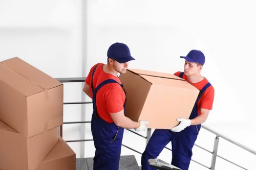 Professional movers loading a removal truck in Chelsea
