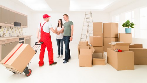 Professional movers handling furniture