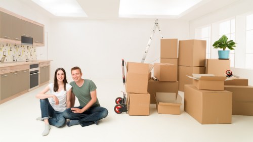 Unloading and setting up furniture in a new home